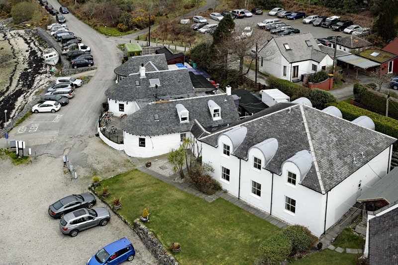 An aerial view of The Pierhouse Hotel, Port Appin, north of Oban, Argyll & Bute
