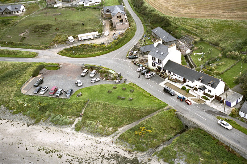 An aerial view of Port Logan Village, The Rhinns of Galloway, Dumfries & Galloway