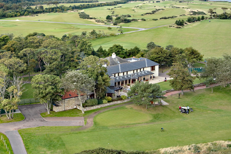 An aerial view of The Eden Clubhouse and Pilmour House, St Andrews, Fife